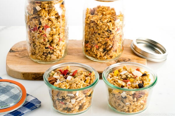 Mason jars and Weck jars containing homemade granola.