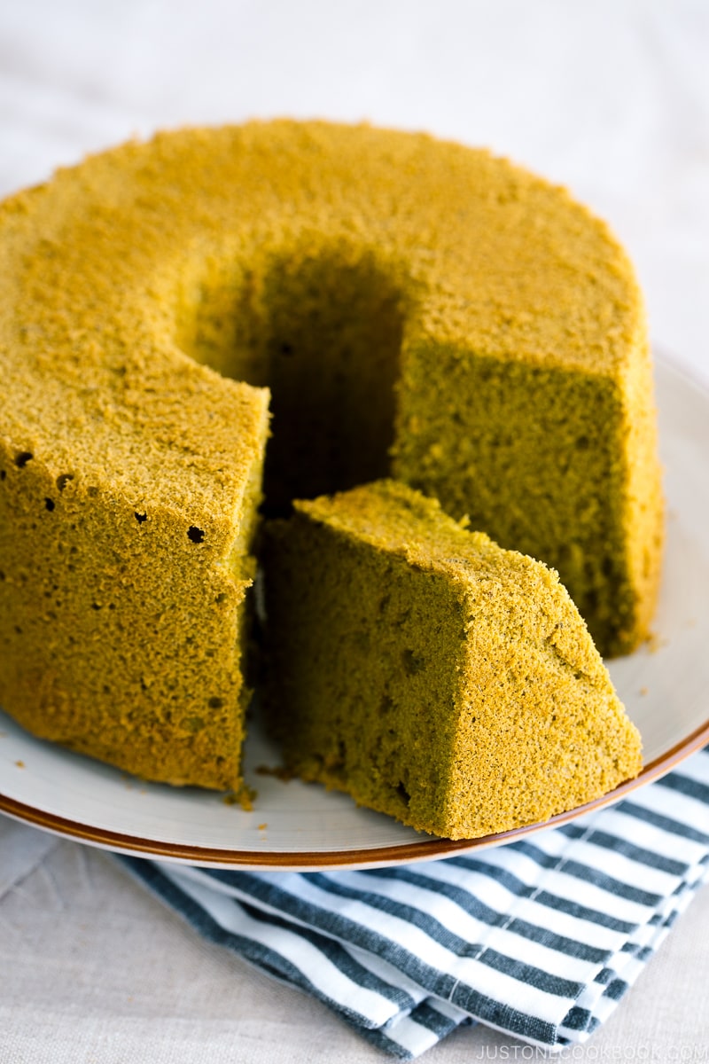 Green tea chiffon cake served on a white plate.