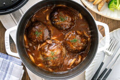 A white staub containing Japanese Stewed Hamburger Steak (Nikomi Hambagu).