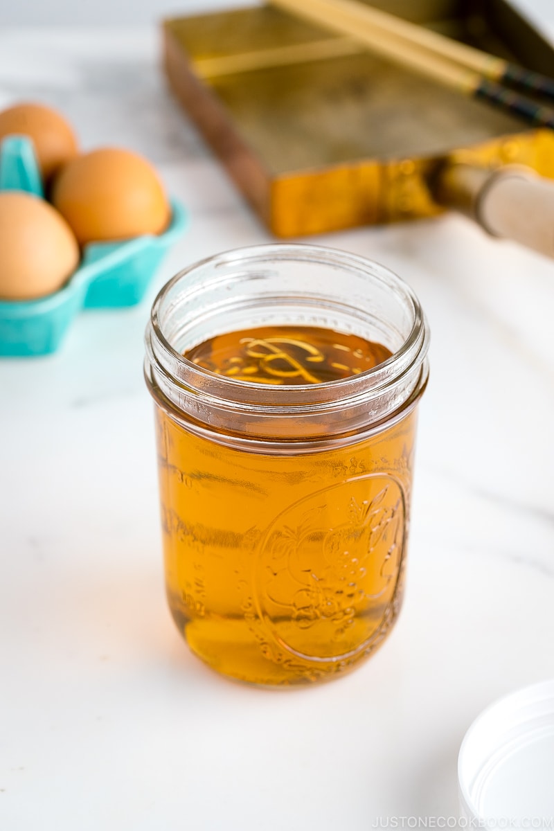 A mason jar containing sweet dashi.