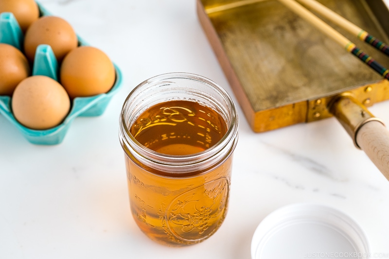 A mason jar containing sweet dashi.