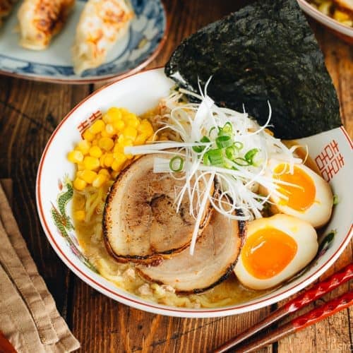 Miso ramen with homemade chashu and ramen egg garnished with nori.