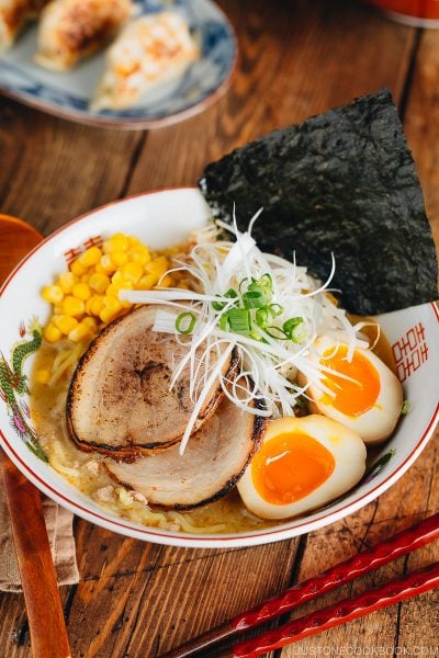 Miso ramen with homemade chashu and ramen egg garnished with nori.