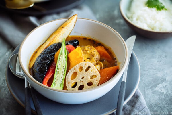 A white bowl containing sapporo soup curry.