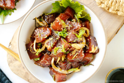 A white bowl containing Ahi Tuna Poke.