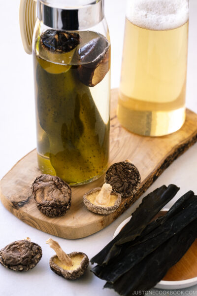 Glass pitchers containing vegan dashi (shiitake kombu dashi).