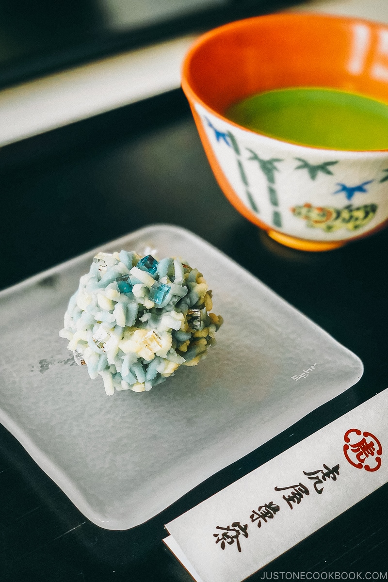 Nerikiri served on a plate along with matcha.