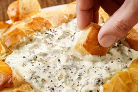 Absolutely Wonderful Cheesy, Creamy Spinach Artichoke Dip